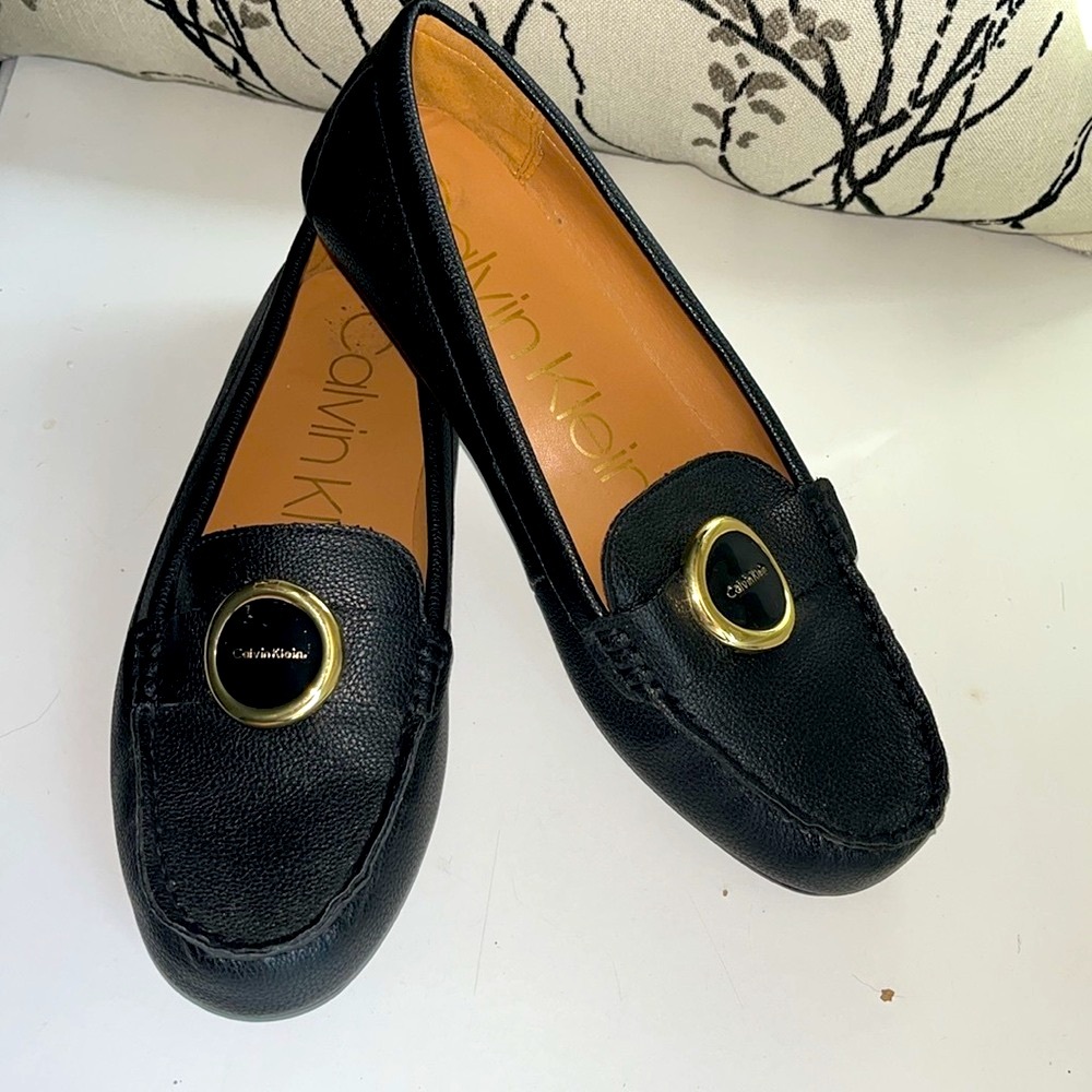 Calvin Klein Leana faux leather black loafer shoes with gold and black logo top